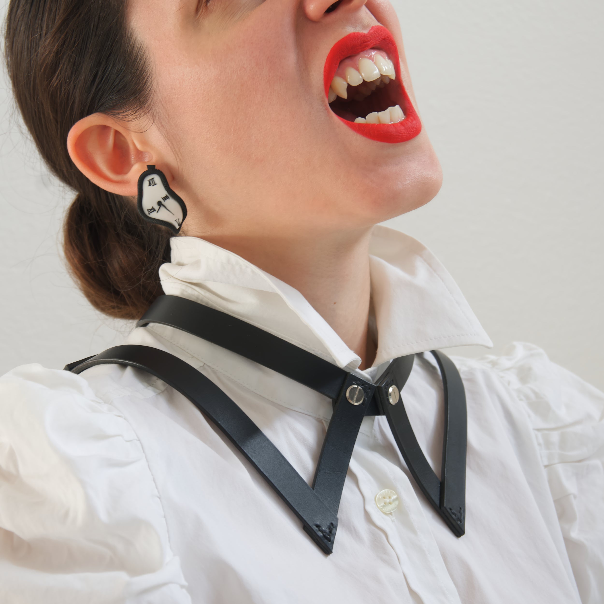black leather choker collar on a shirt