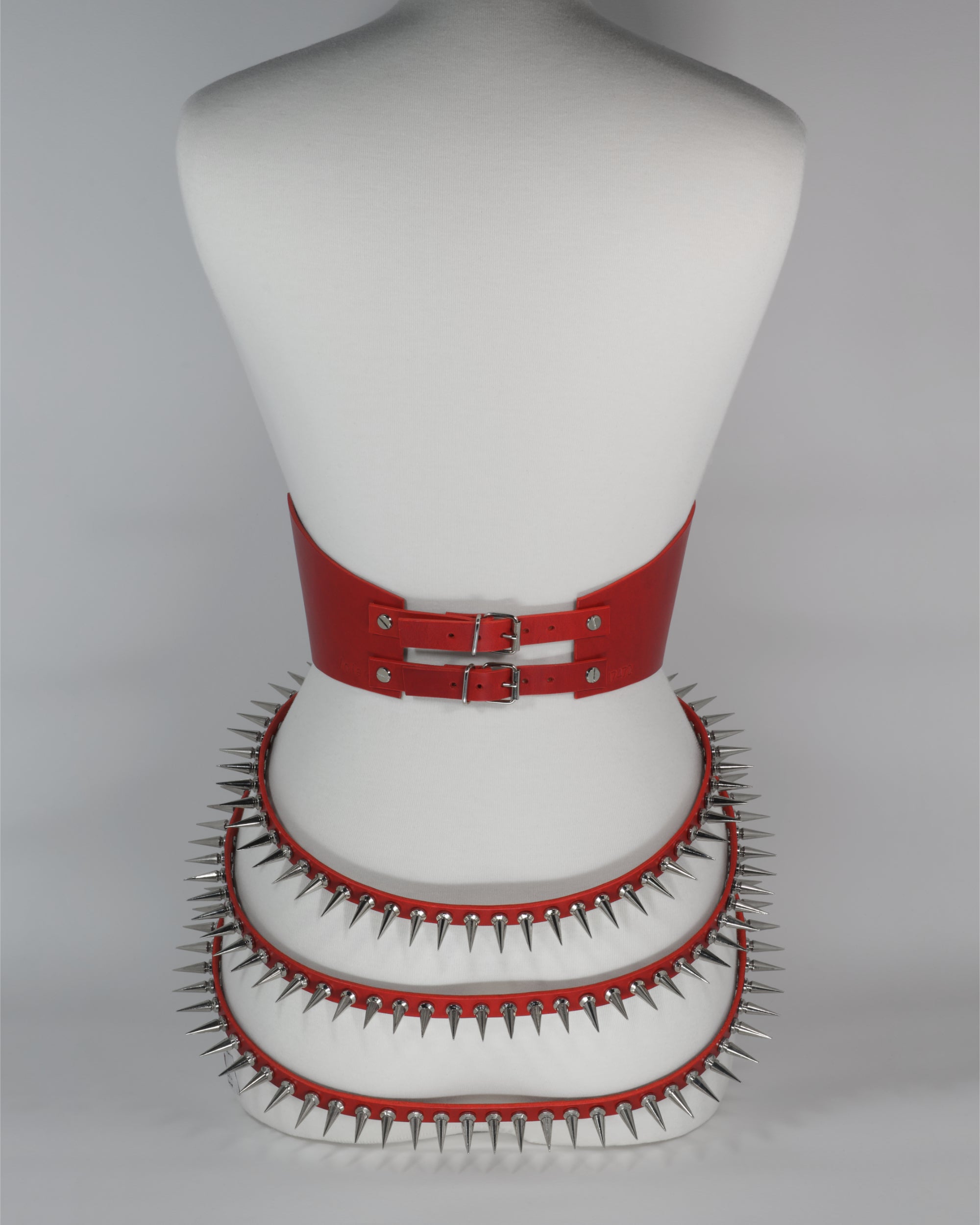 red leather belt with spike straps #color_red