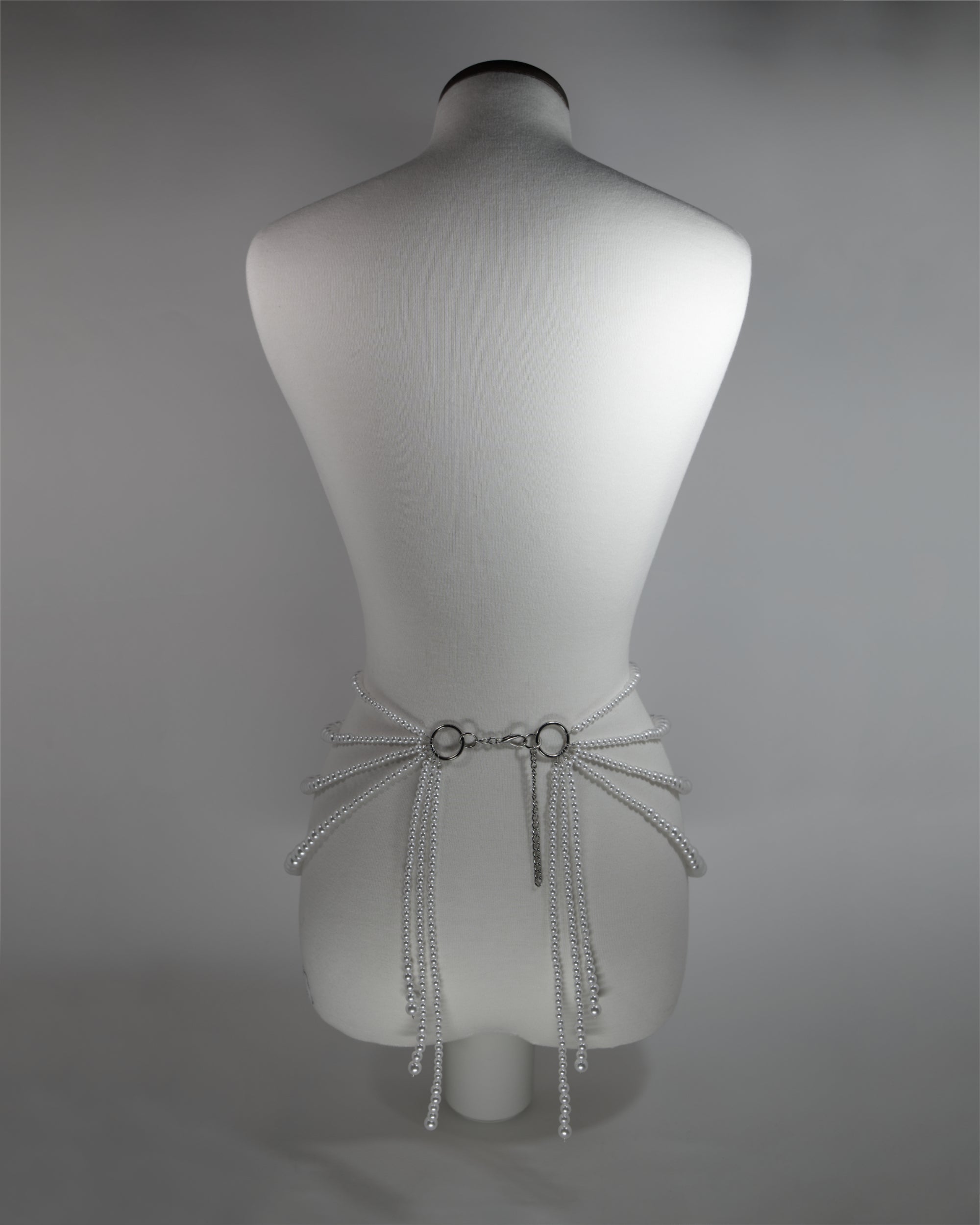 belt with pearls and draping design on the hips inspired by aphrodite