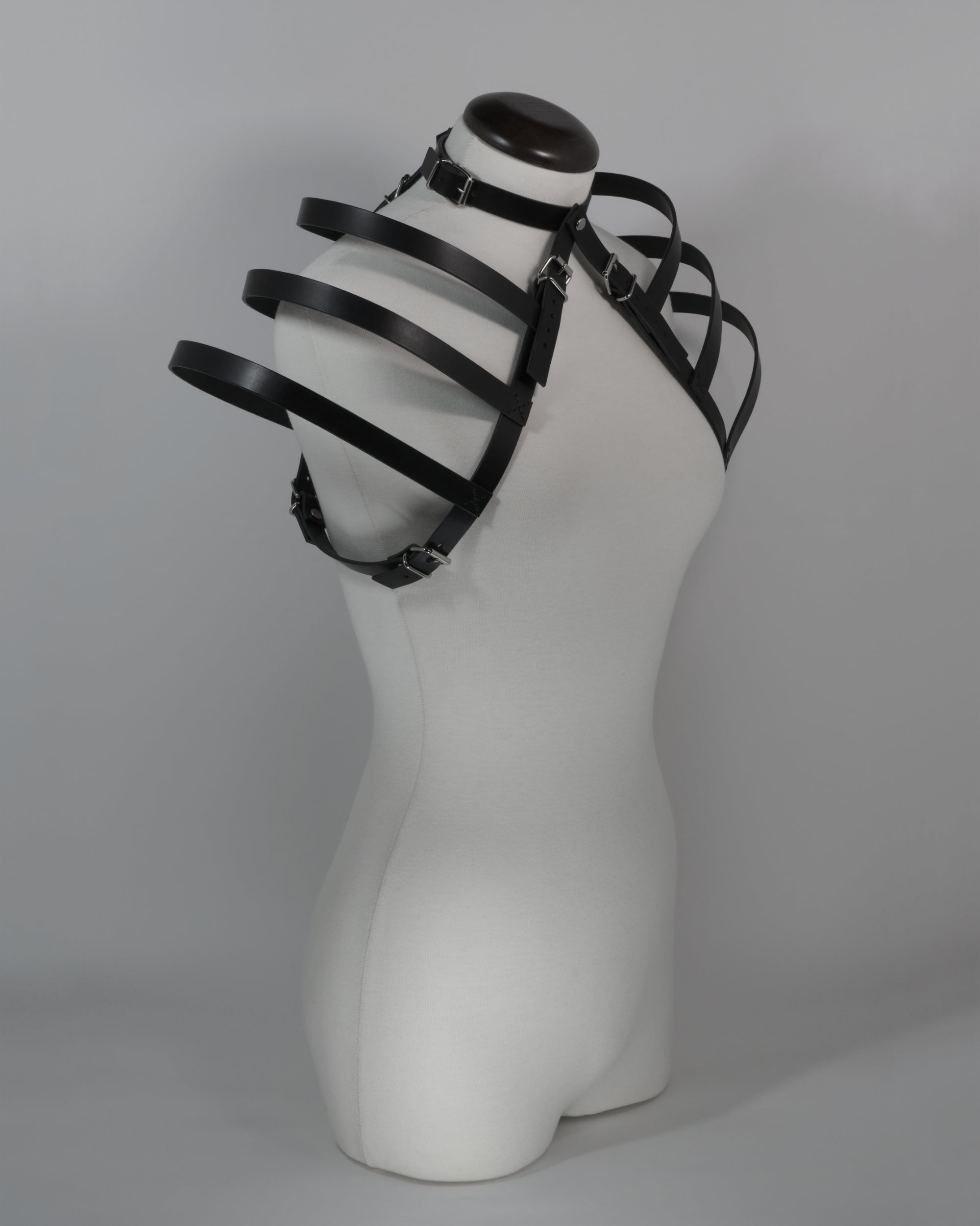 black leather harness with choker avant garde