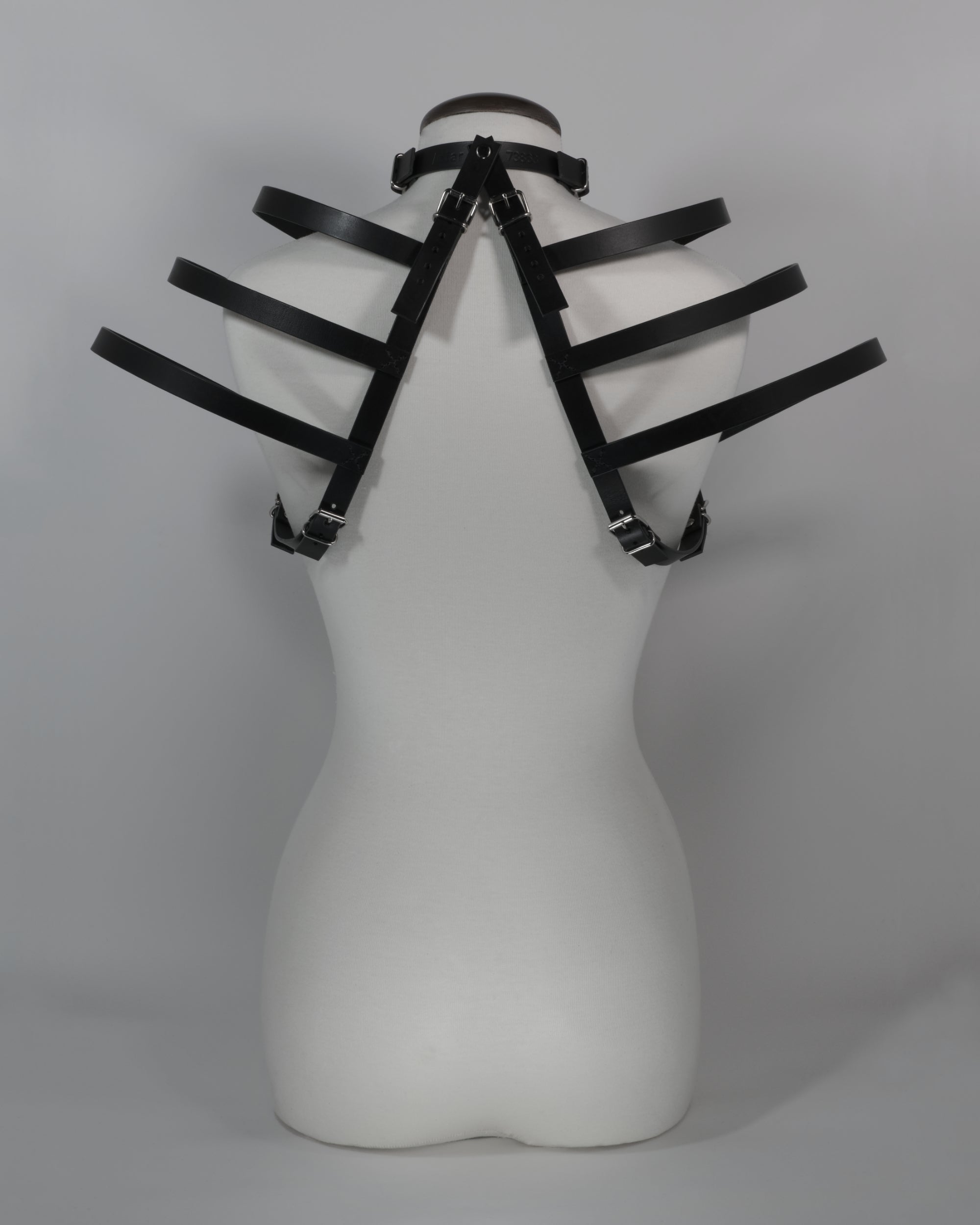 black leather harness with choker avant garde