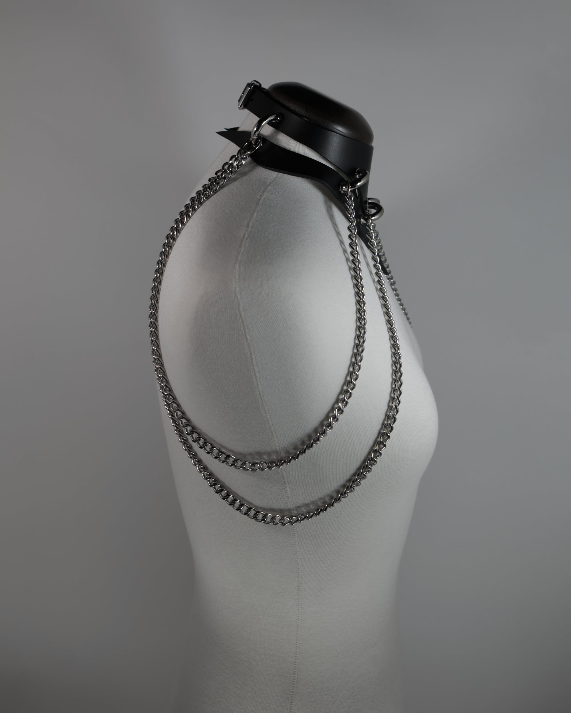 medusa leather choker with chains draping on the shoulders