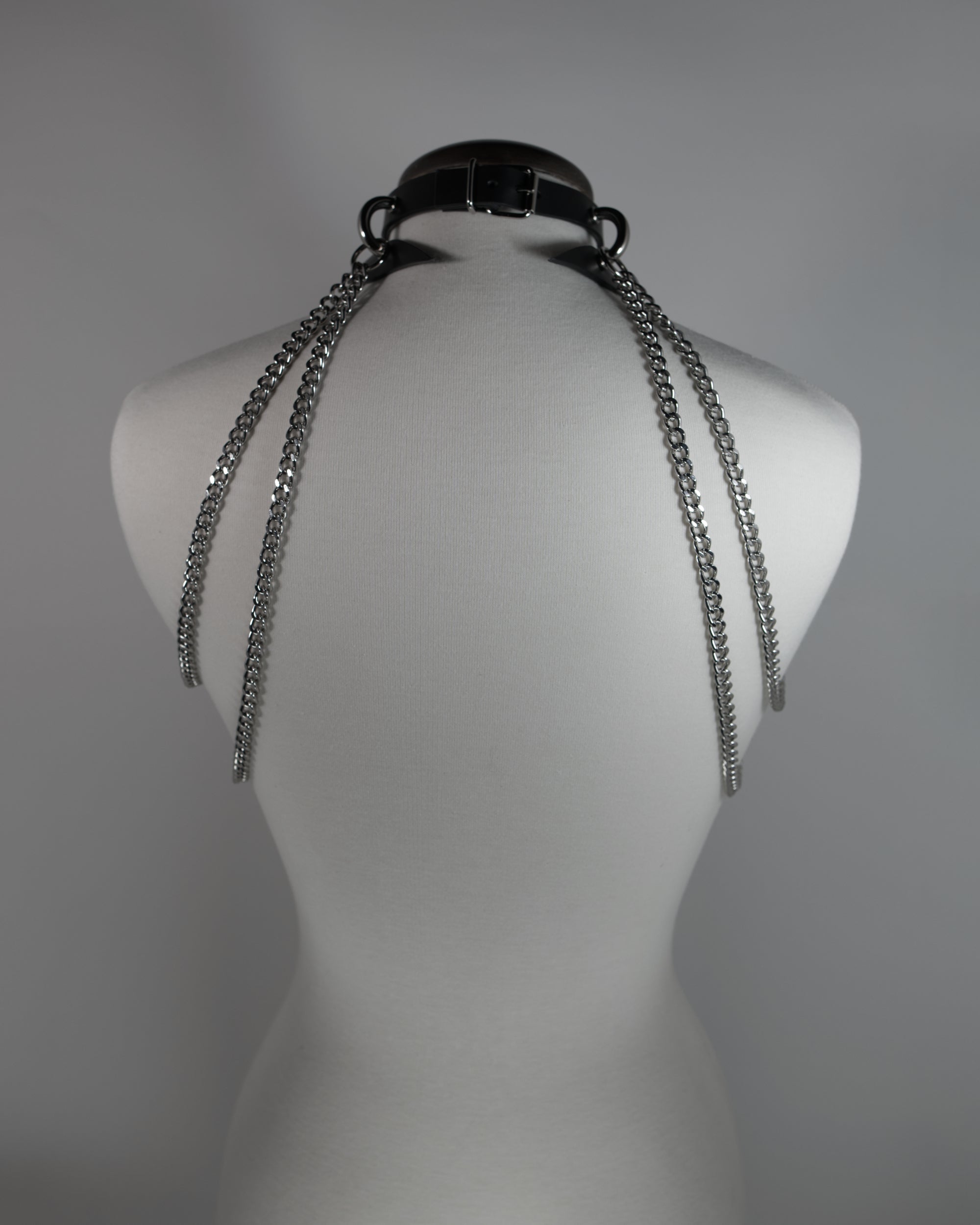 medusa leather choker with chains draping on the shoulders