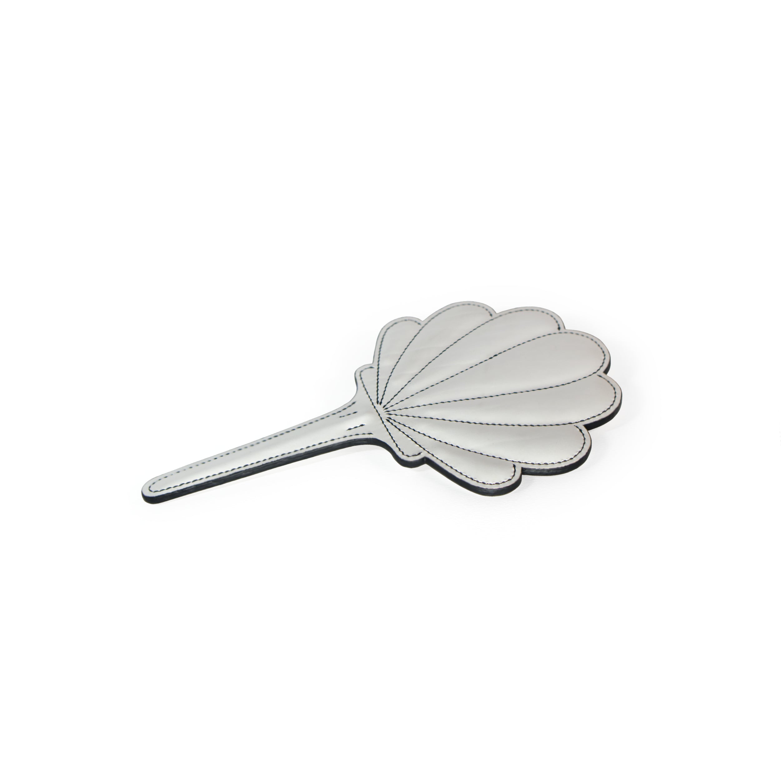 paddle in the shape of a shell inspired by the goddess aphrodite