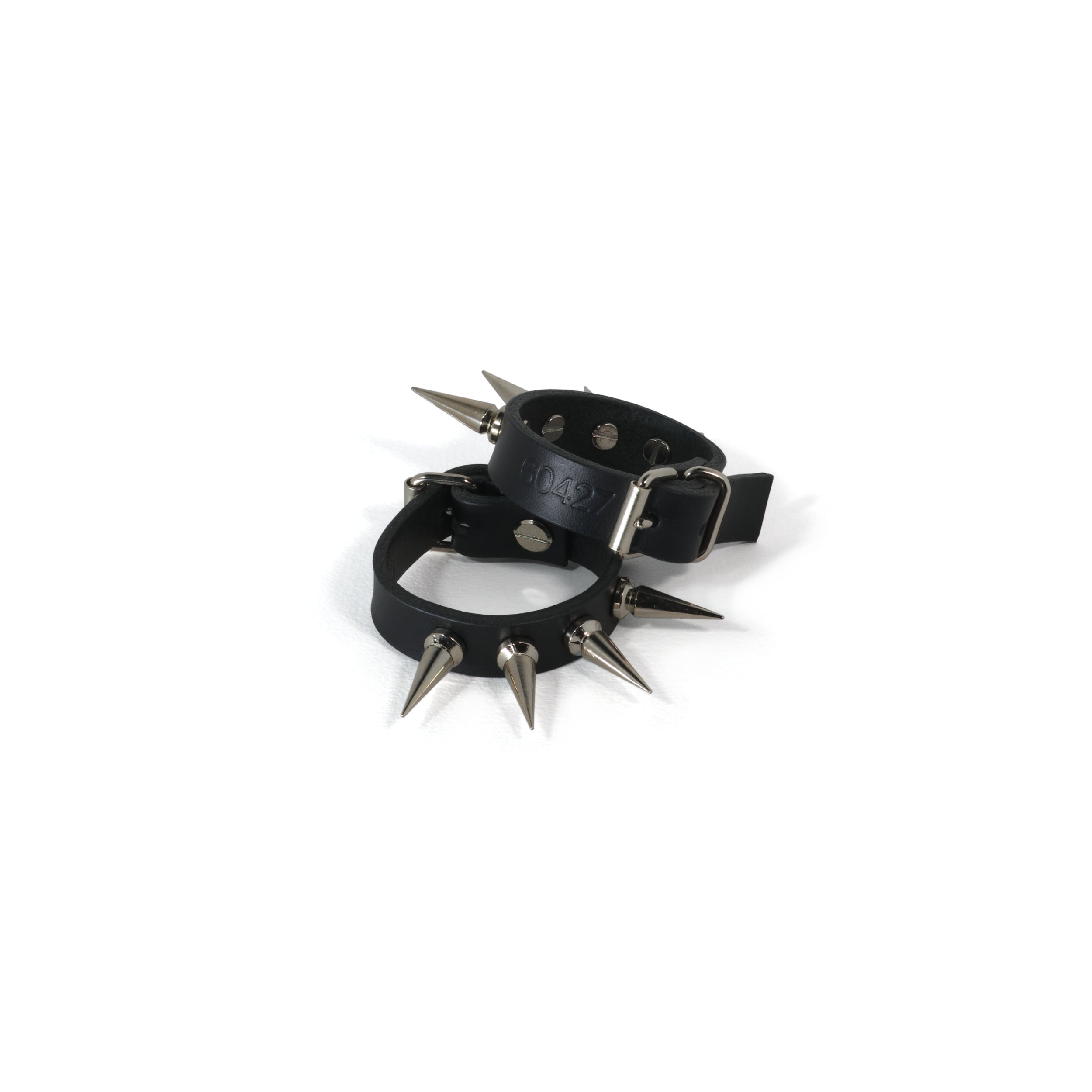 black leather bracelet cuff set with spikes #color_black