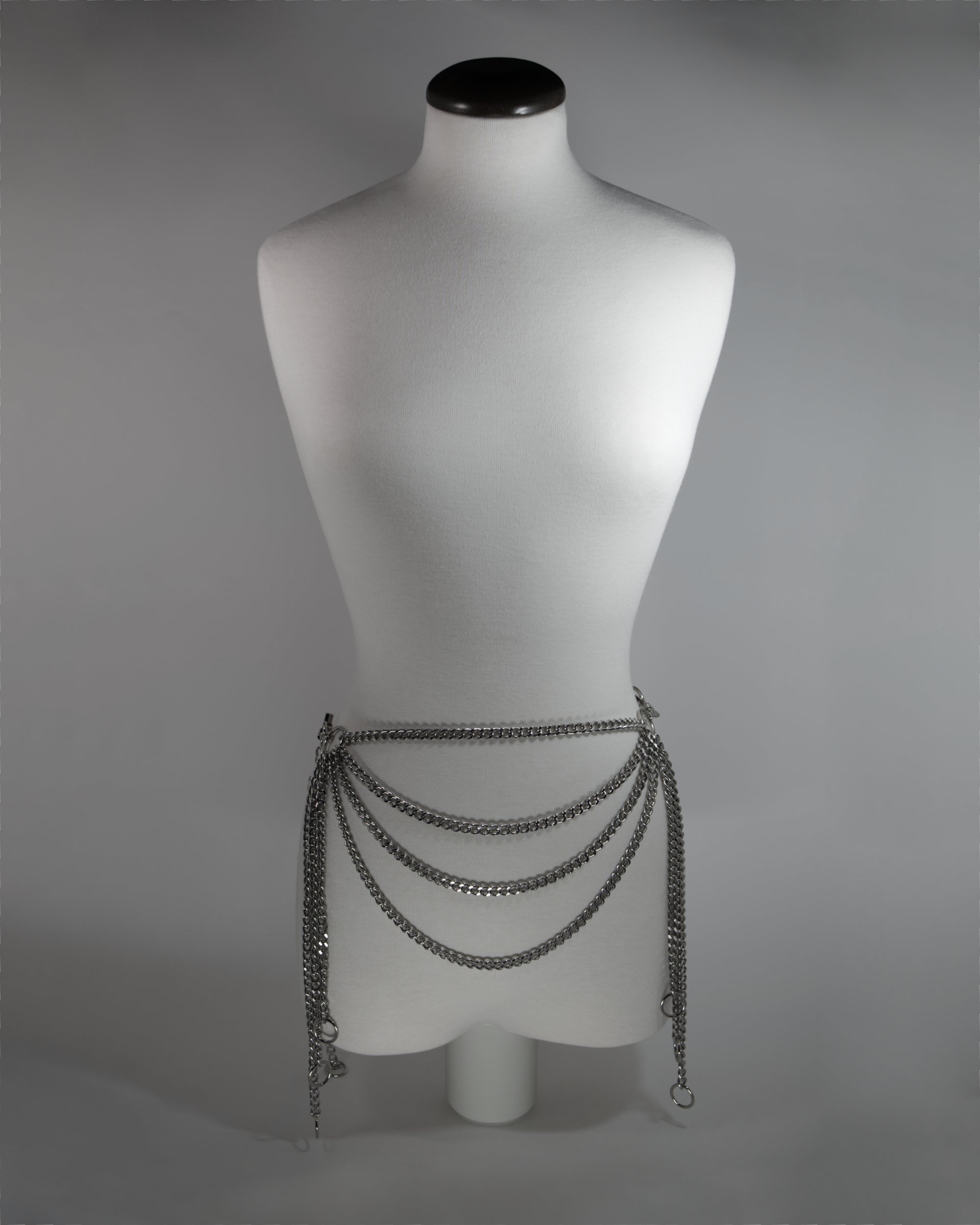 medusa inspired chain belt with draping details in the front and back
