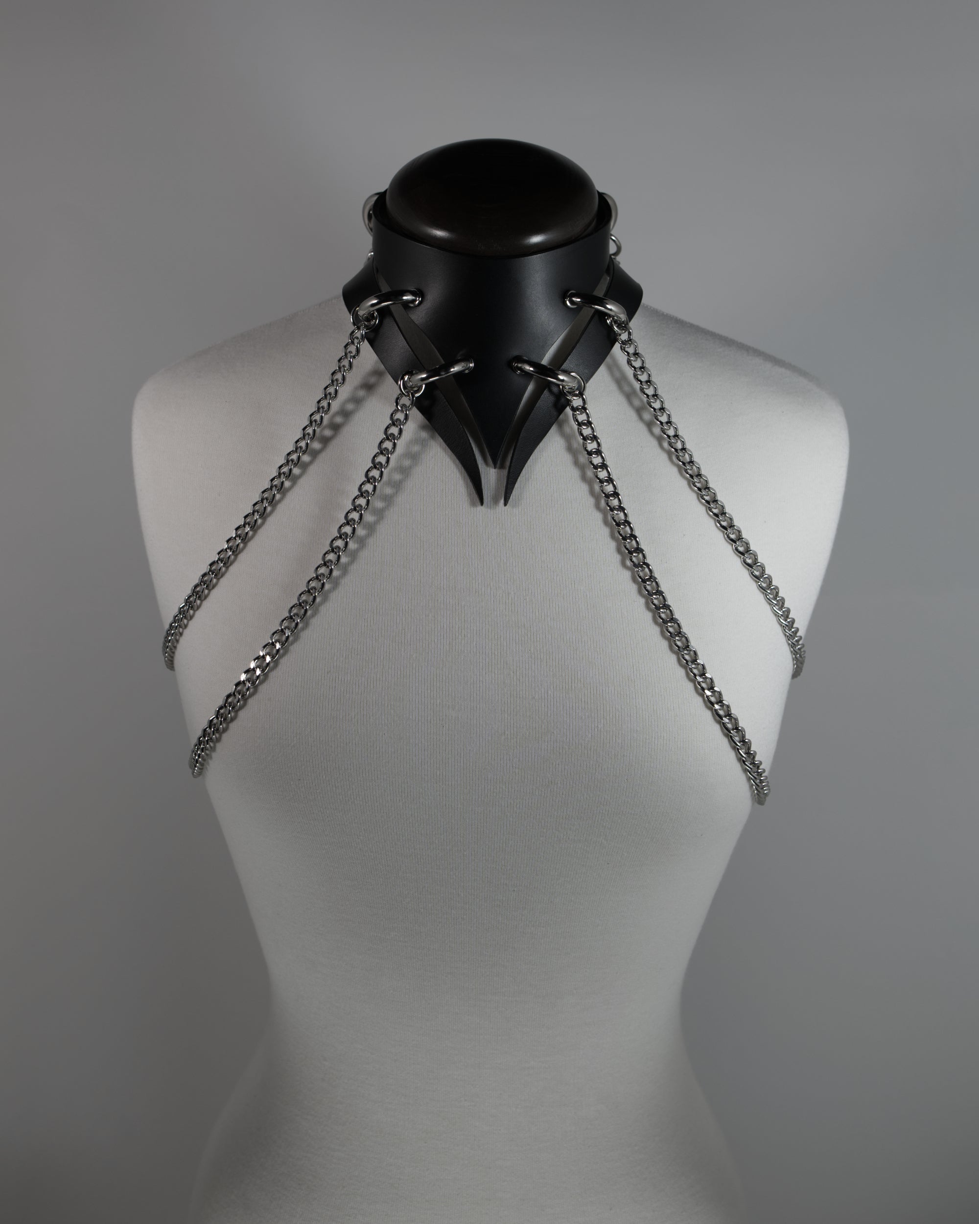 medusa leather choker with chains draping on the shoulders